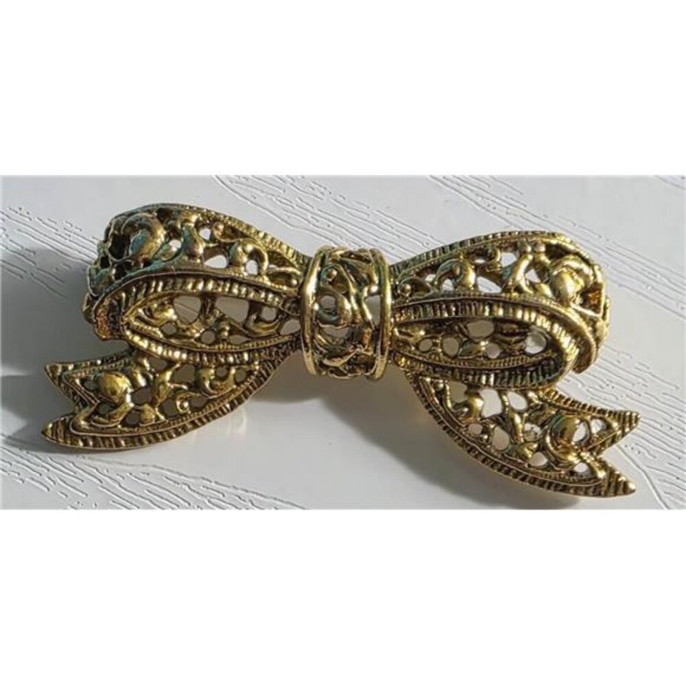Gold Tone Bowtie Brooch 0.5 x 1.75 Inch Filigree Vintage Pin